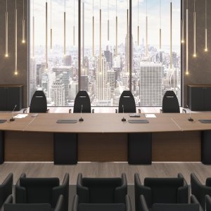 Halvovalt AlfaOmega konferansebord med ryggpanel i full høyde