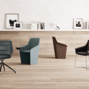 Detalj av den håndverksmessige tone-i-tone-vatteringen på Jera Chair